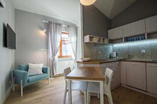 Апартаменты Grand Apartments - Neptun Park. Гданьск Apartment -  Wypoczynkowa 34A-7